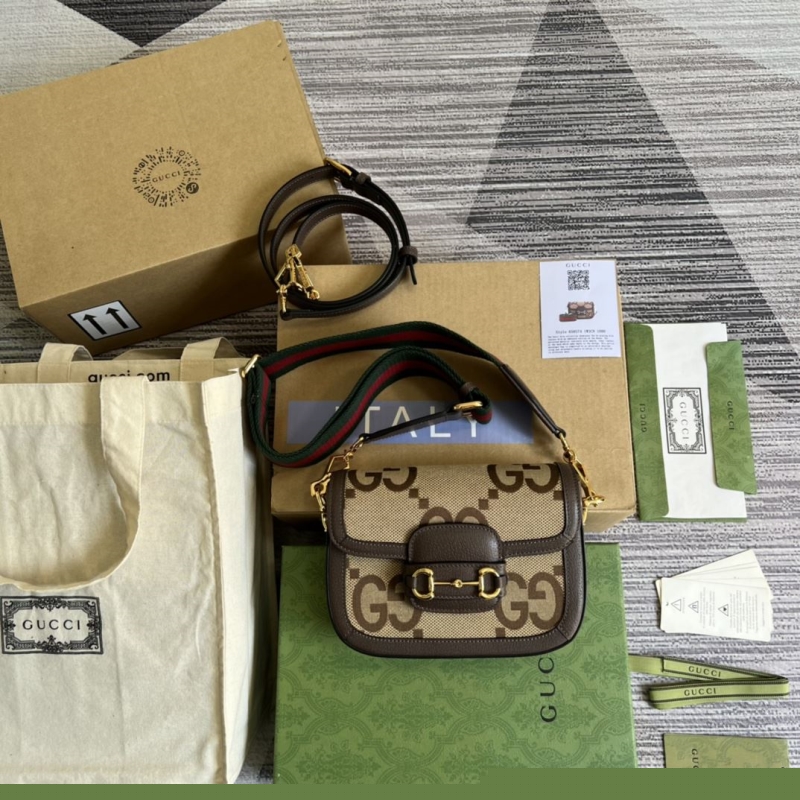 G*u*i satchel bags